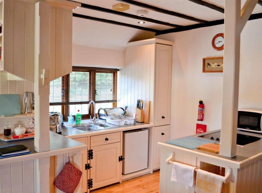 Open plan living/dining room/kitchen (photo 4) at Fox Cottage in Jevington, near Eastbourne, East Sussex