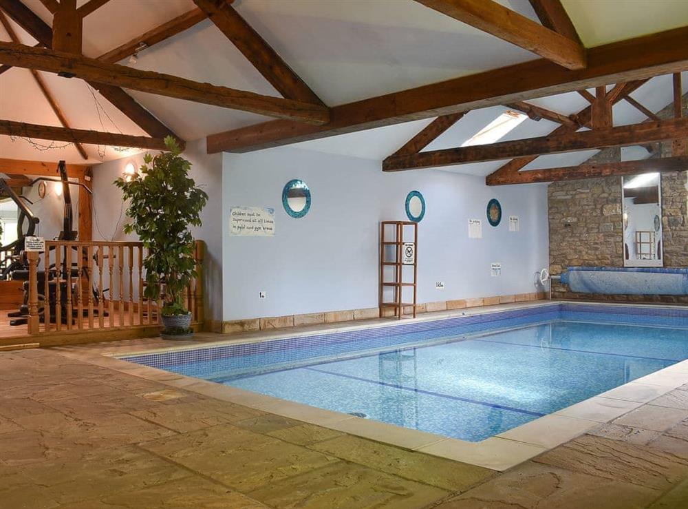 Shared swimming pool at Fox Cover Cottage in Little Edstone, near Pickering, North Yorkshire