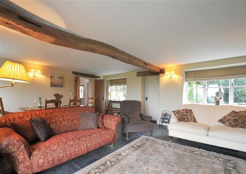 Relax in the living area at Foxdene Cottage, Bowness