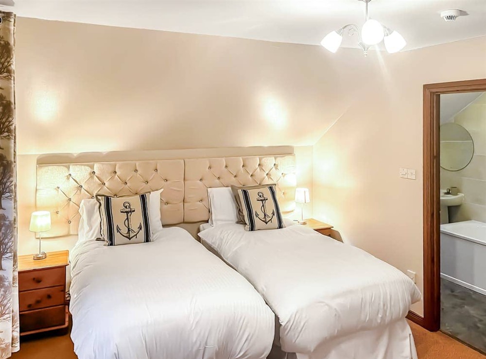 Twin bedroom at Foxglove Cottage 2 in Drymen, Lanarkshire