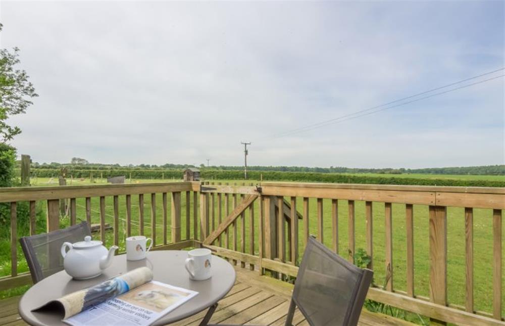 Deck:  With table and seating for two at Foxglove, Houghton near Kings Lynn