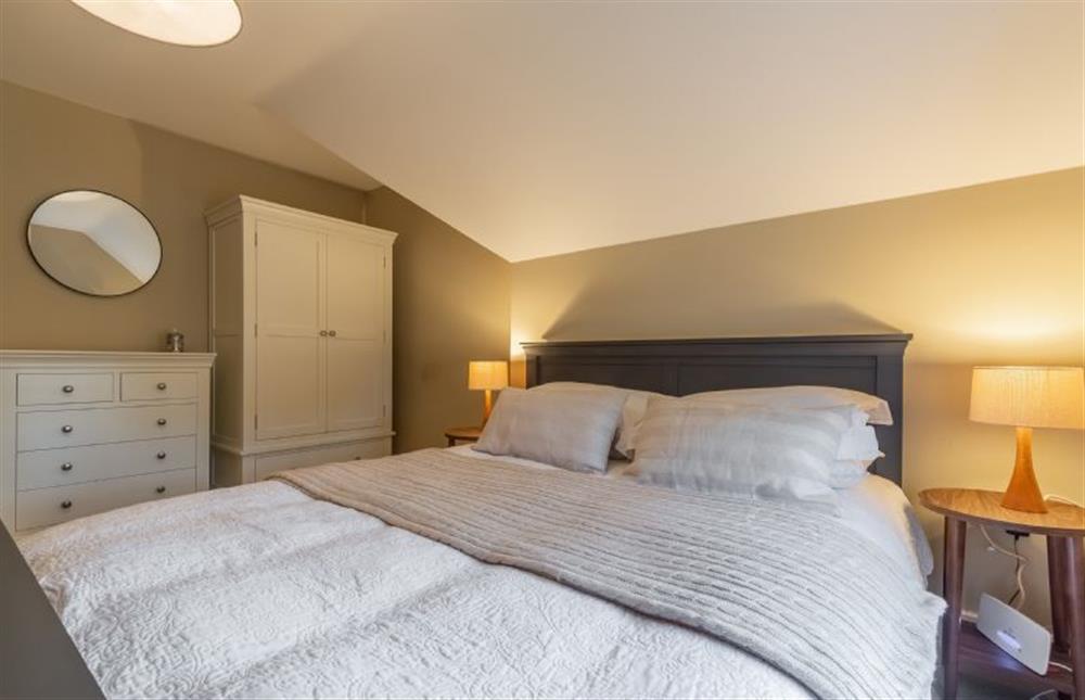 First floor: Bedroom two has a comfortable king-size bed at Foxhill House, South Creake near Fakenham