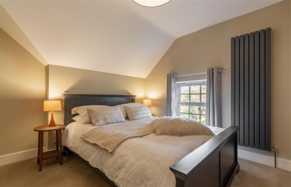 First floor: Bedroom two with king-size bed at Foxhill House, South Creake near Fakenham