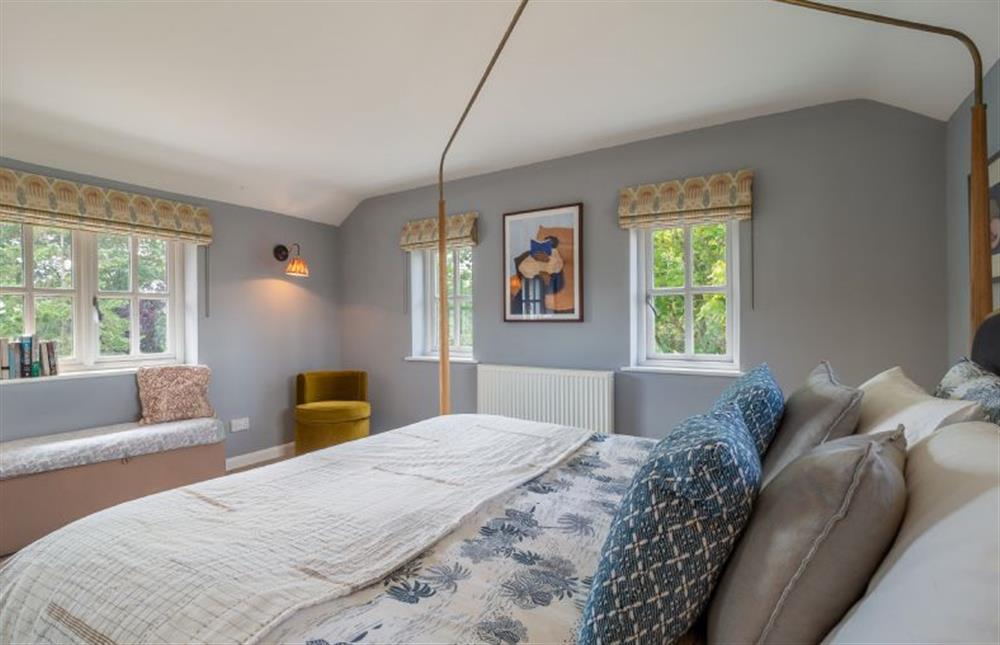 Dual-aspect master bedroom at Foxhole Cottage, Framsden