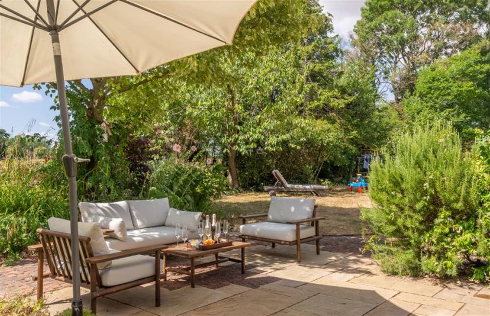 The patio is perfect for a sundowner at Foxhole Cottage, Framsden