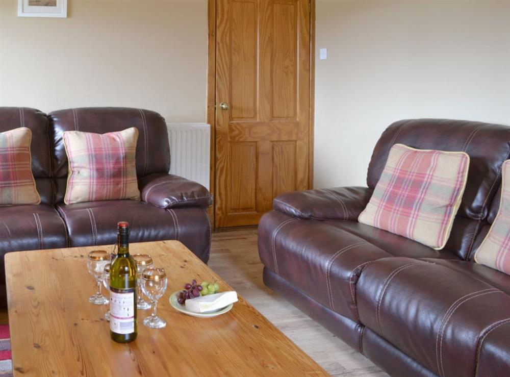 Comfortable living room at Foxhole Farm Cottage in Beauly, Inverness-Shire