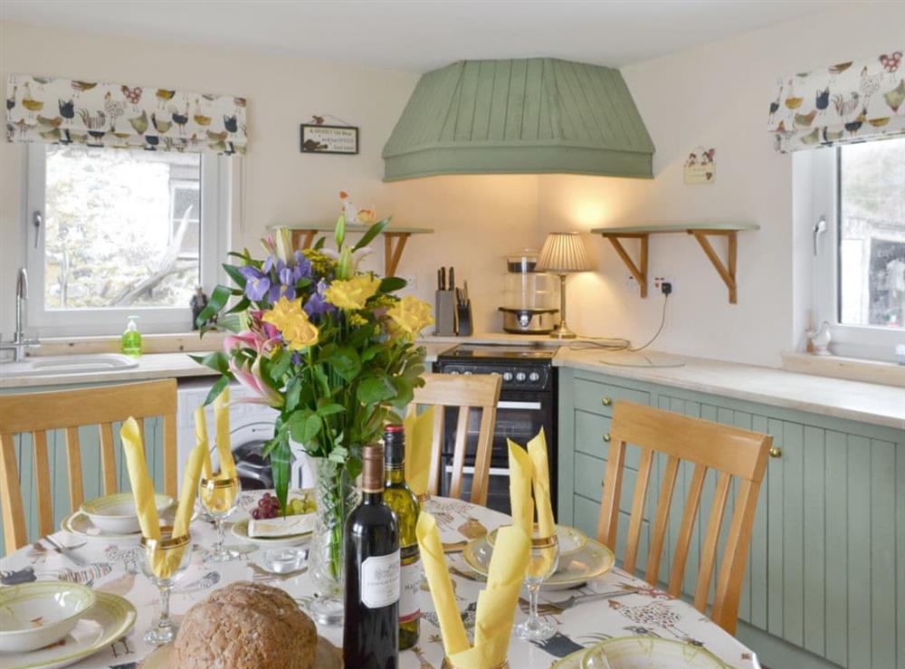 Delightful dining area within kitchen at Foxhole Farm Cottage in Beauly, Inverness-Shire