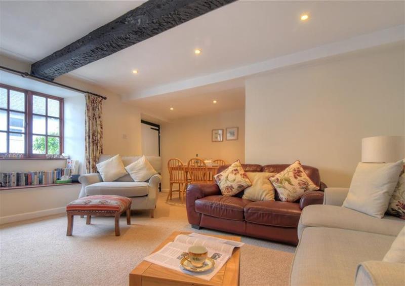 Relax in the living area at Foxley Cottage, Charmouth