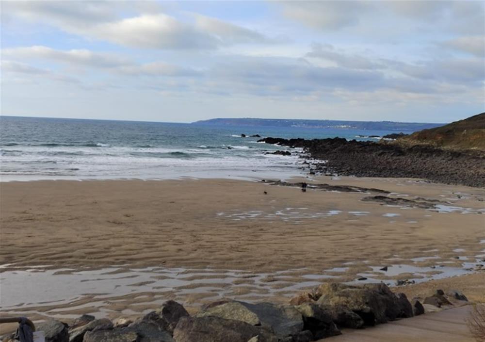 Perran Sands, at Perranuthnoe, is a great choice for a beach day - a wide stretch of sand for walking or a popular spot for surfers when the tide is in. at Foxy Shepherd's Hut in Penzance
