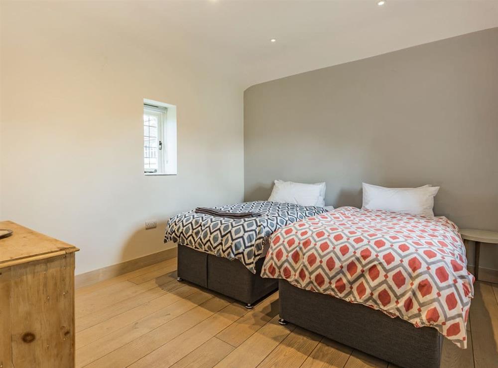 Twin bedroom at Freeland Farmhouse Stables in Storrington, West Sussex