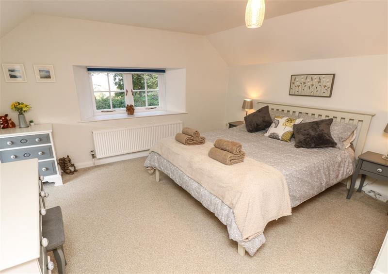 A bedroom in Freemantle Lodge at Freemantle Lodge, Wroxall