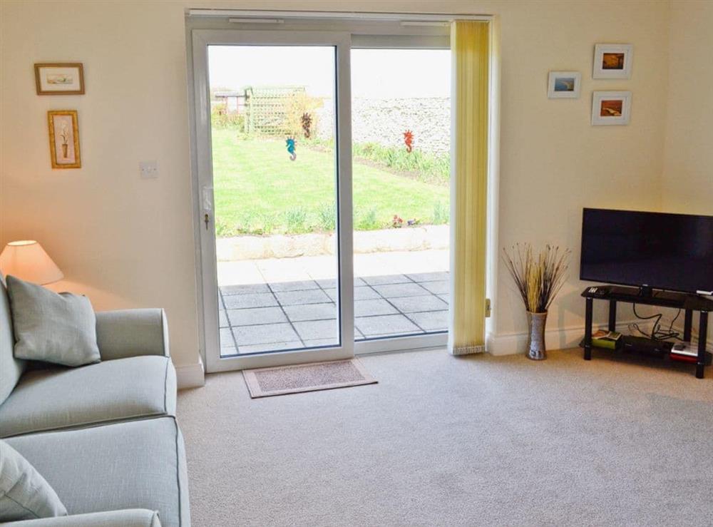 Living room at Freshwater Bay View in Portland, Dorset