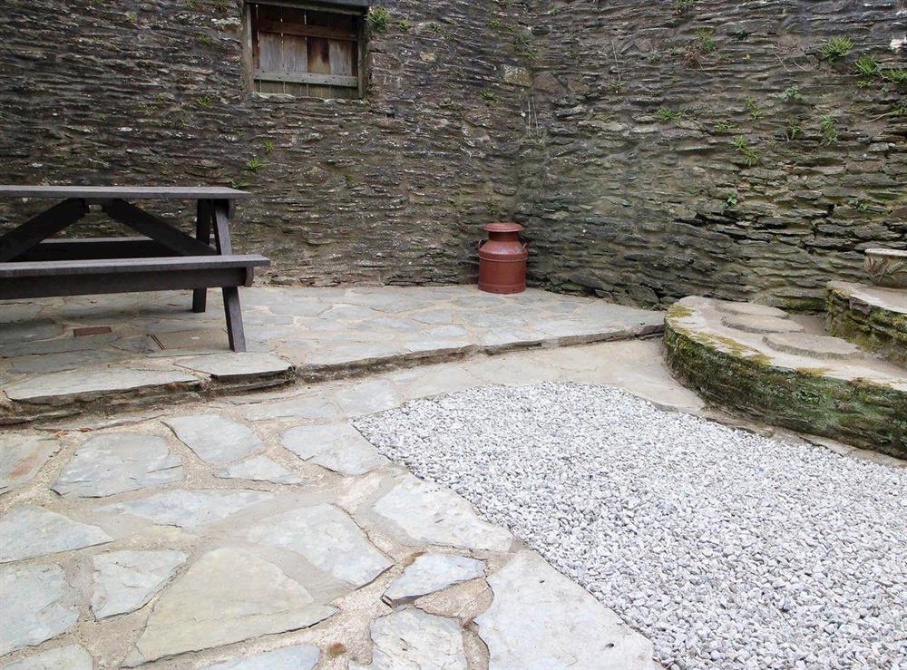 Enclosed patio with picnic style seating area at Chaffcutters, 