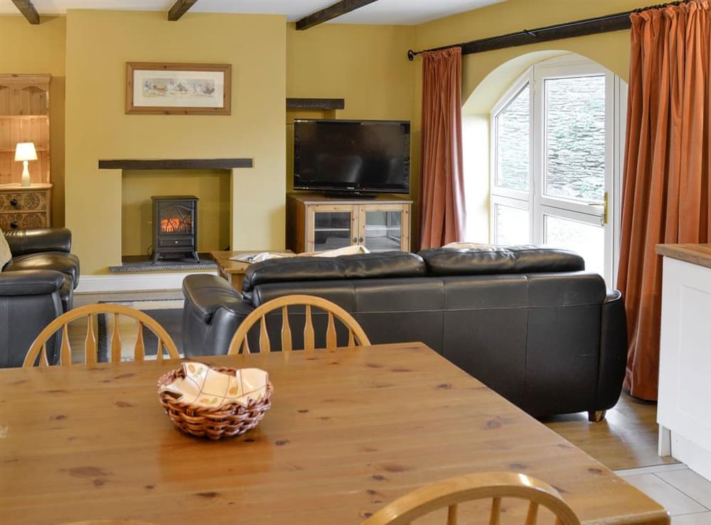 Convenient dining area within open-plan living space at Wheelwrights, 