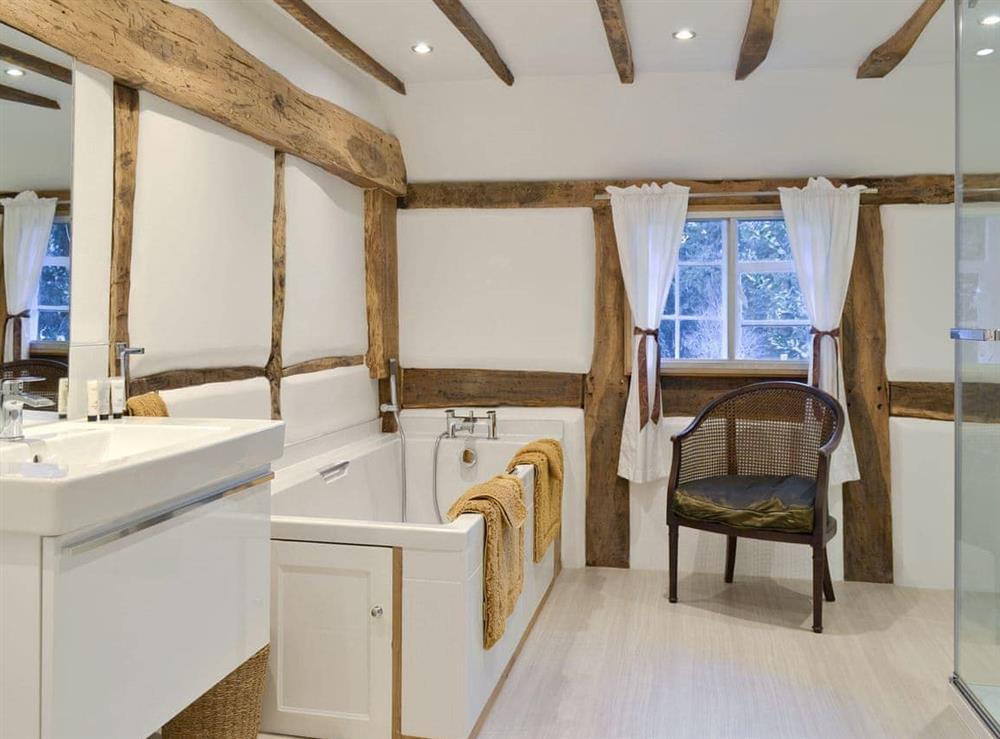 Modern fitted bathroom with traditional heritage features at Friary Cottage in Ludlow, Shropshire