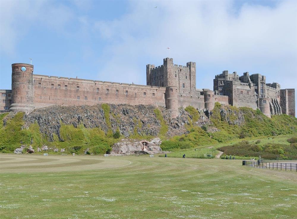 Bamburgh Castle at Friarystone Cottage in Bamburgh, Northumberland., Great Britain