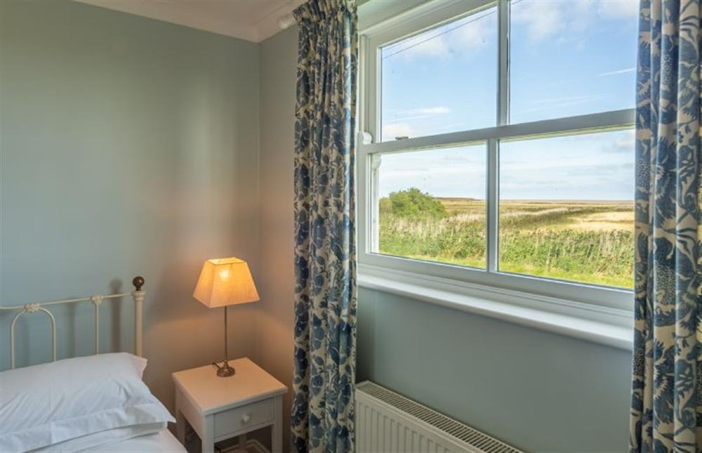 Ground floor:  King-size bedroom with views over the marshes (photo 2) at Fridays Barn, Salthouse near Holt