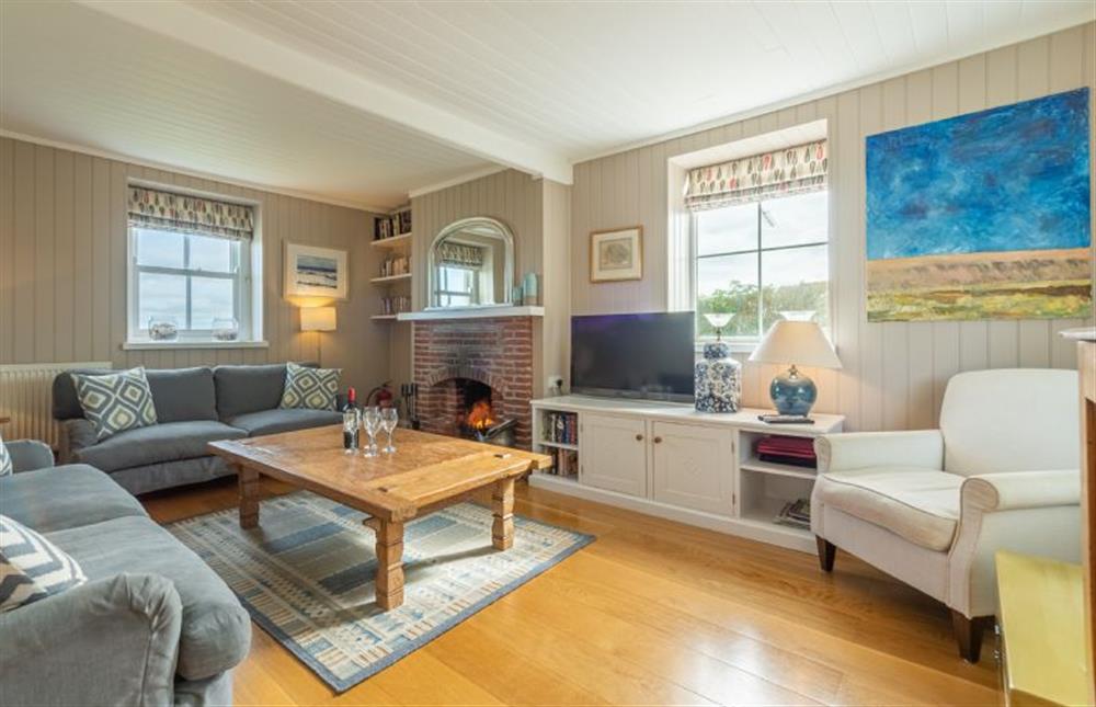 Ground floor:  Sitting room with flatscreen television