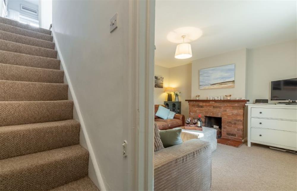 Ground floor: Stairs leading from the sitting area at Froggy Cottage, Thornham near Hunstanton