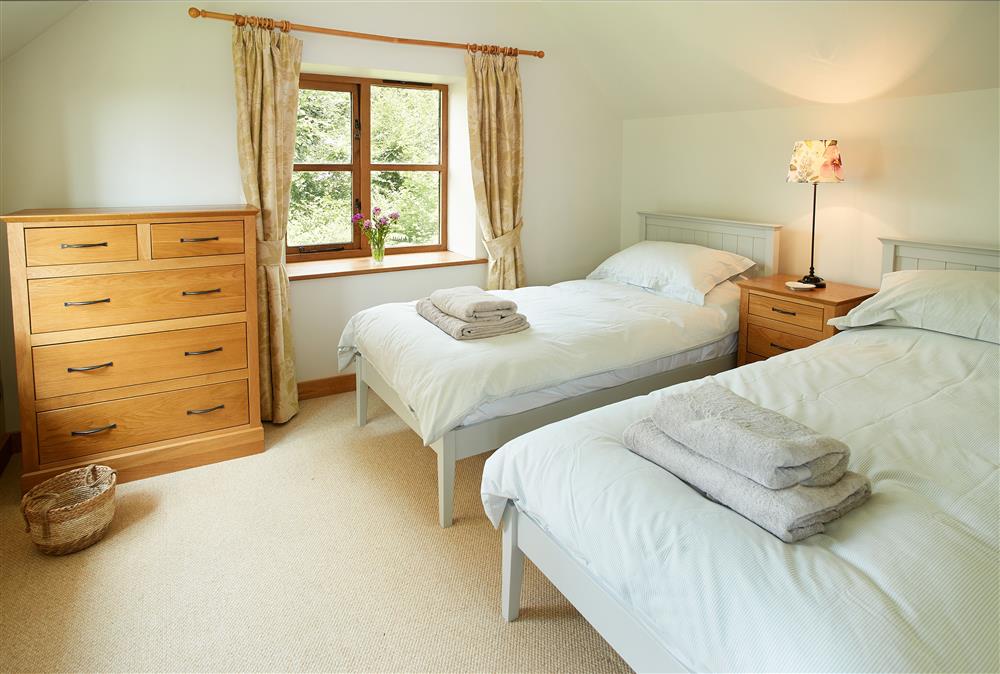 First floor: Bedroom two with twin 3ft single beds at Fron Cottage, Llangynog, Oswestry