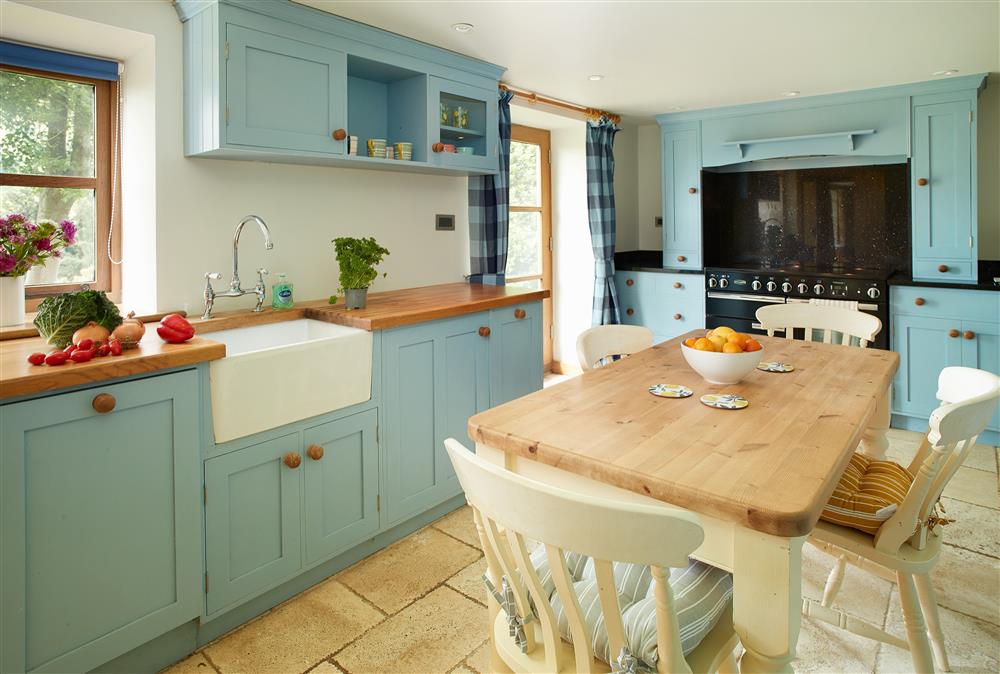 Ground floor: Well-equipped kitchen with range-style cooker and Belfast sink at Fron Cottage, Llangynog, Oswestry