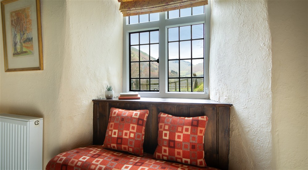 One of the window seats in the sitting room of Fron Dirion, with views of the valley, Powys at Fron Dirion in Dinas Mawddwy, Powys