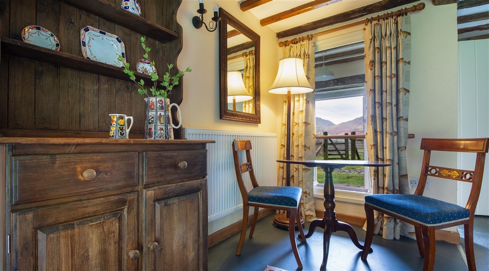 The table for two in the sitting room of Fron Dirion, Powys at Fron Dirion in Dinas Mawddwy, Powys