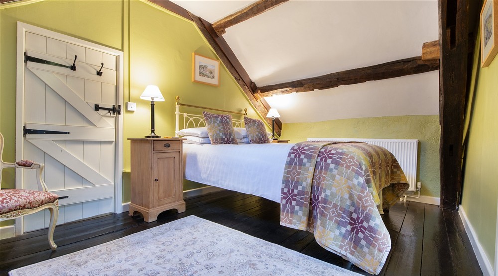 The walk-through double bedroom (photo 2) at Fron Dirion in Dinas Mawddwy, Powys