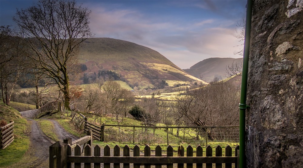 Views of hills from the front harden at Fron Dirion in Dinas Mawddwy, Powys
