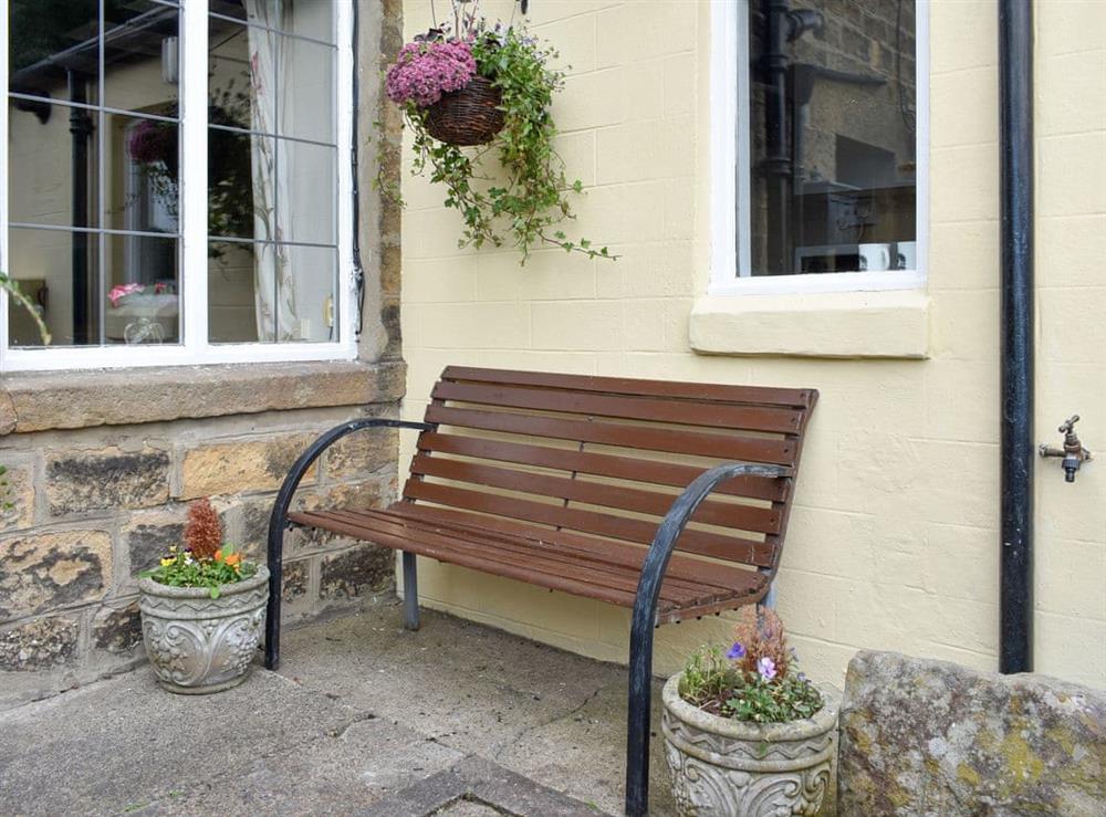 Outdoor seating on the patio at Front Row Cottage, River View in Ovingham, near Prudhoe, Northumberland
