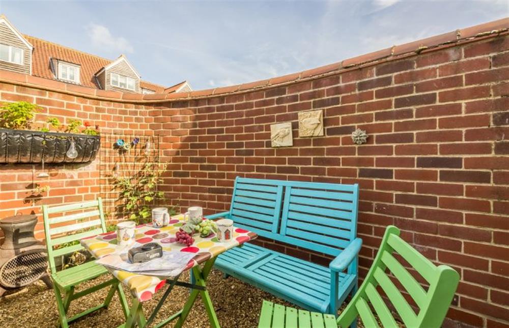 Rear courtyard with garden furniture (photo 2) at Fulmar, Wells-next-the-Sea