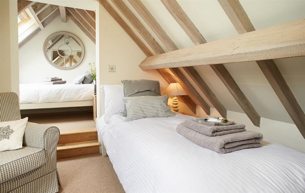 Twin bedroom with one 3’ bed and one 2’6 bed at Furlong Barn, Long Itchington