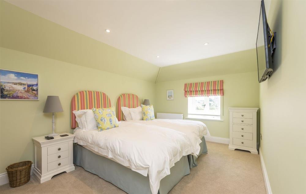 Bedroom five with with zip and link bed (can be configured as twin or super-king bed on request) at Furlongs, Abbotsbury