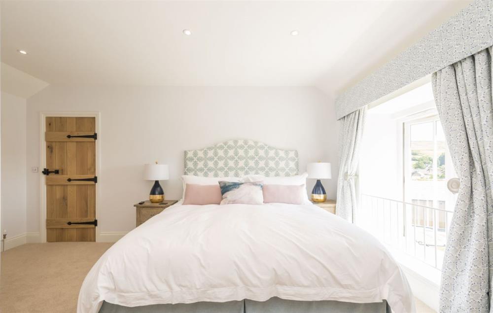 Bedroom three with super-king bed and en-suite shower room at Furlongs, Abbotsbury
