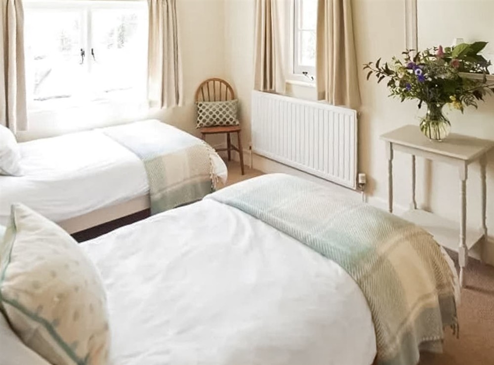Twin bedroom at Fursdon Cottage in Cadbury, Devon
