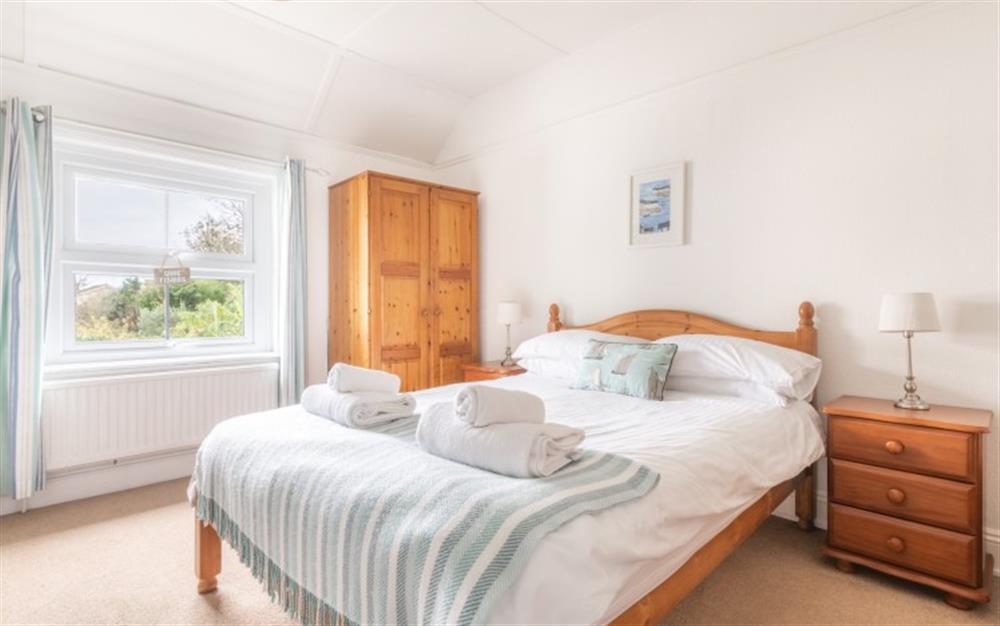 A bedroom in Fuschia Cottage at Fuschia Cottage in Lyme Regis