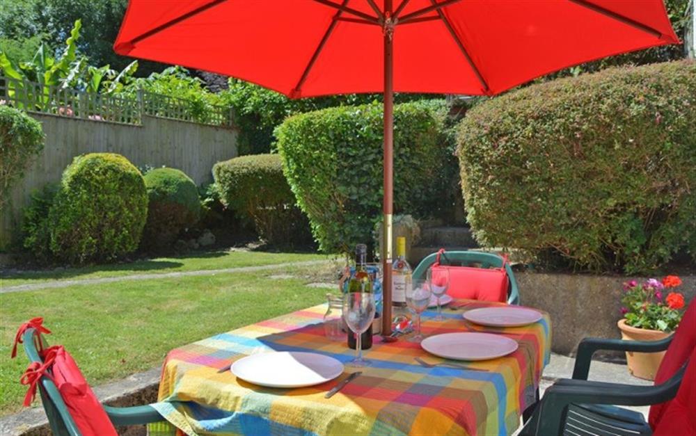 The enclosed private back garden at Fuschia Cottage  at Fuschia Cottage in Lyme Regis