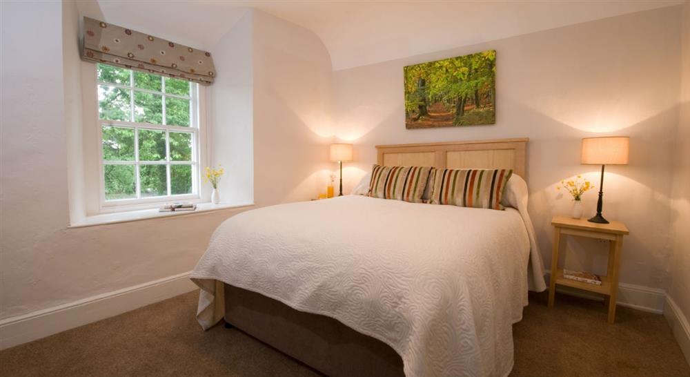 One of the two double bedrooms at Fyne Court Cottage in Bridgwater, Somerset