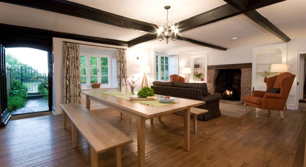 The open plan dining area in the family room at Fyne Court Cottage in Bridgwater, Somerset