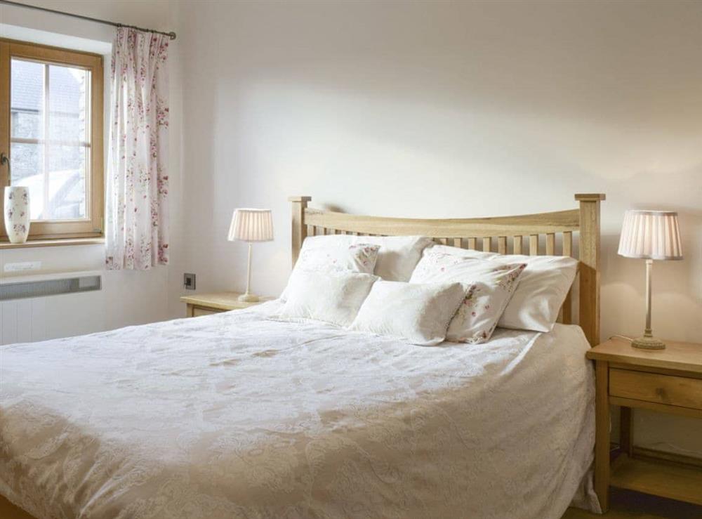 Comfortable double bedroom at Beudy Bach, 
