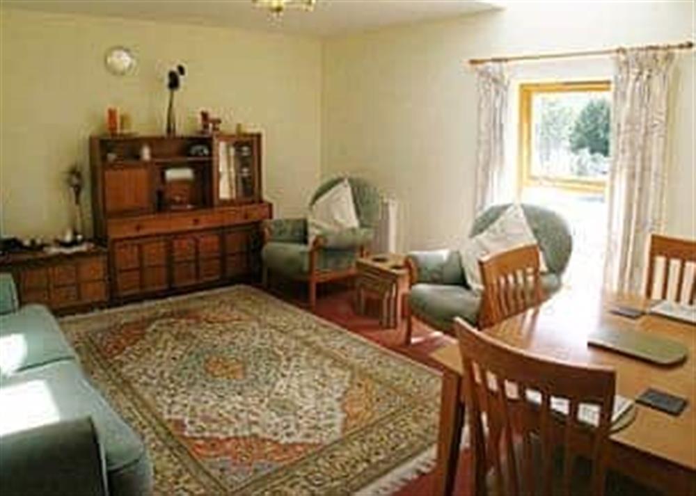 Living room/dining room at Fyvie Cottage in Fort William, Inverness-Shire