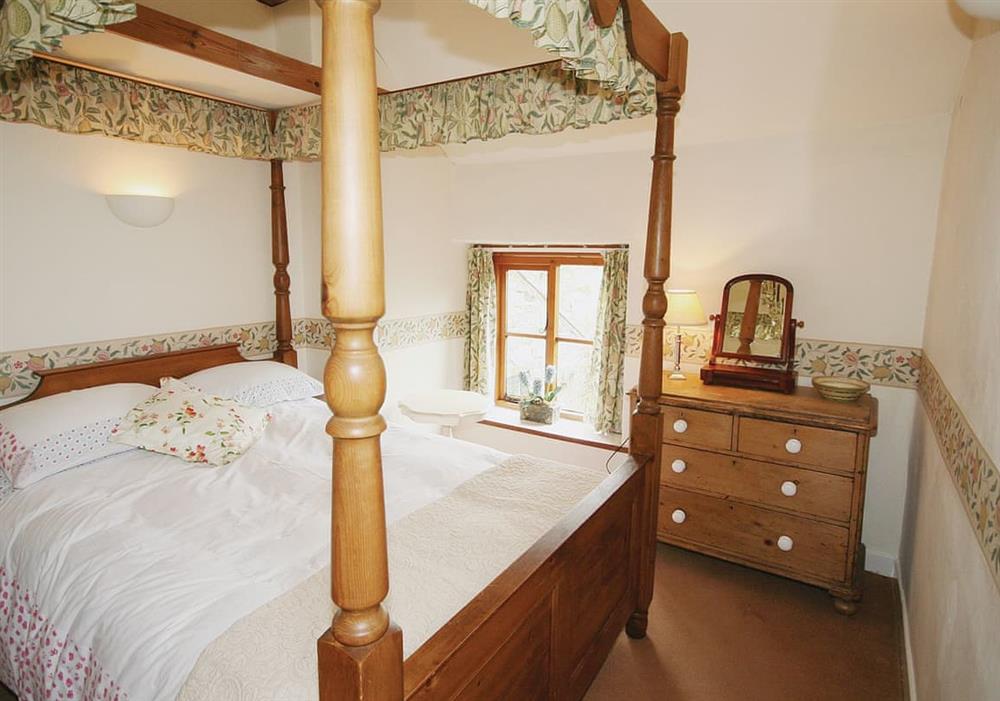 Four Poster bedroom at Gable Cottage in Leek, Staffordshire