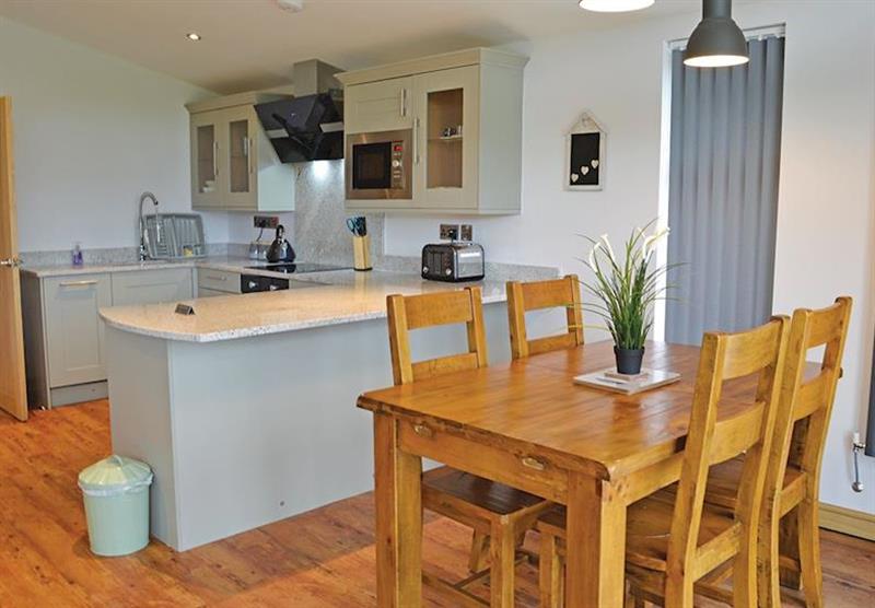 Kitchen and dining area in the Sandringham Lodge at Gadlas Park in Ellesmere, Shropshire