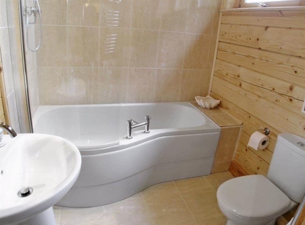 Modern bathroom with over-bath shower at Gairlochy Bay in Gairlochy, near Fort William., Inverness-Shire