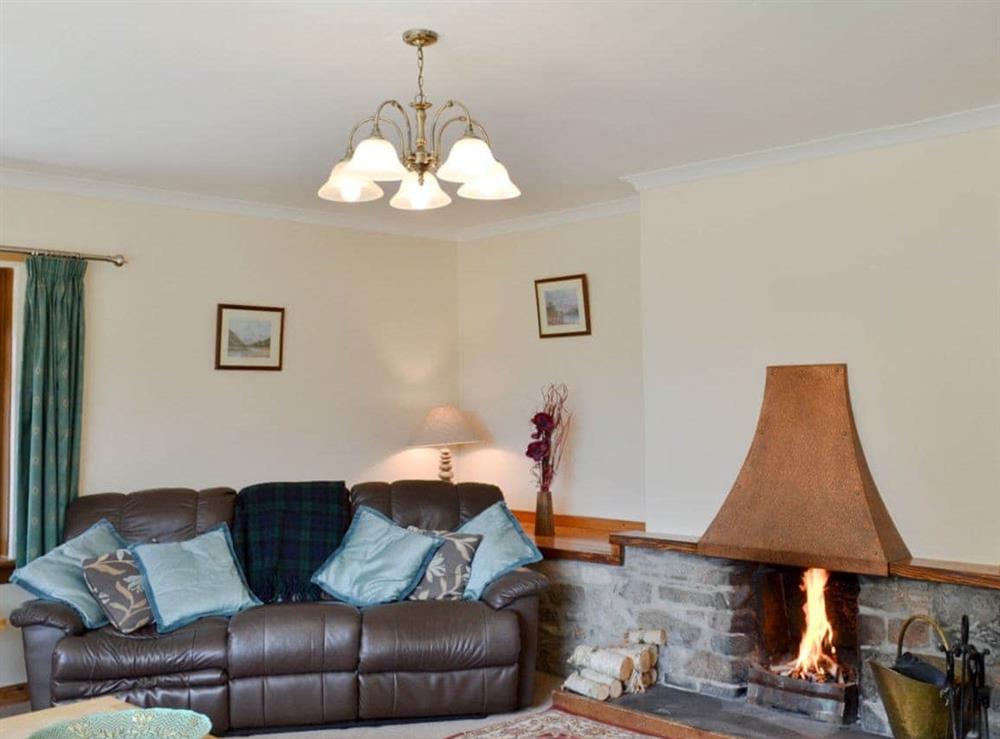 Comfortable living room with an open fire at Gairlochy Bay, nr. Spean Bridge in , Inverness-Shire