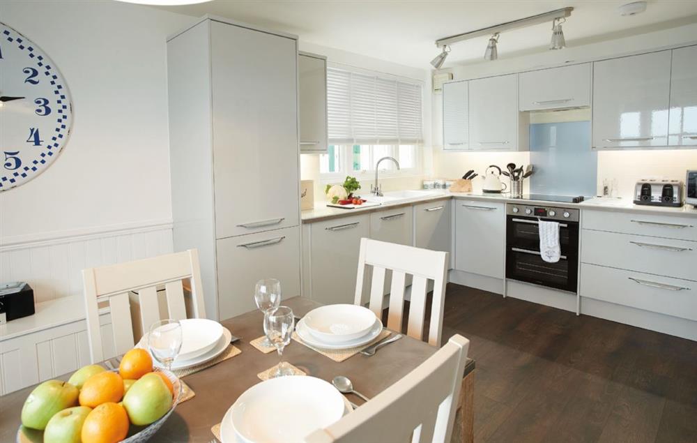 Kitchen with dining area which has sea views at Galatea, Whitby Lighthouse