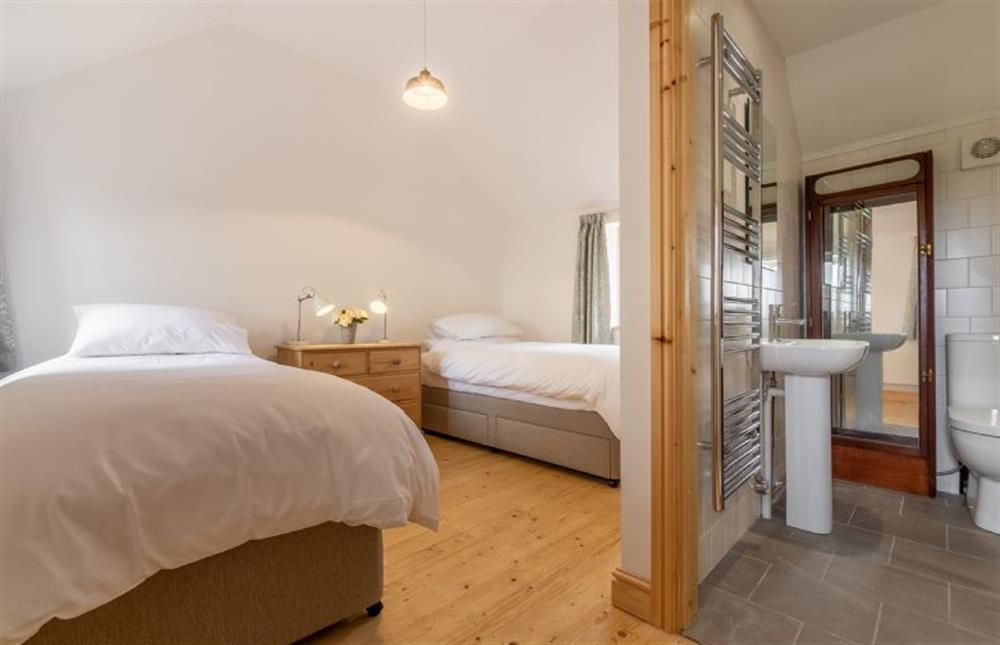 Ground floor:  Bedroom two with door to en-suite shower room at Gallery Cottage, Wighton near Wells-next-the-Sea