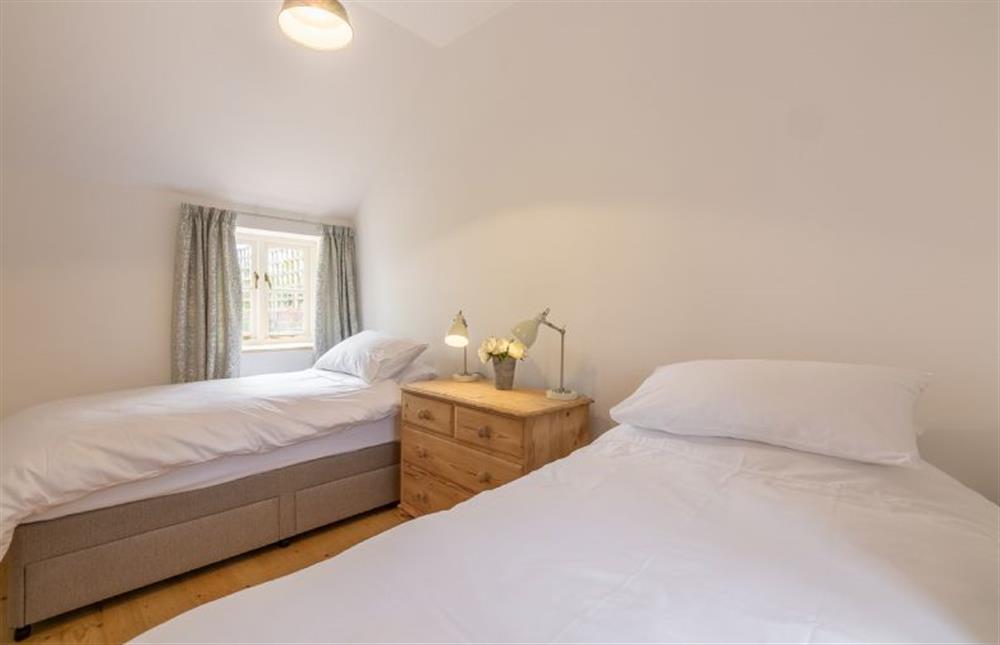 Ground floor:  Bedroom two with full-size single beds at Gallery Cottage, Wighton near Wells-next-the-Sea