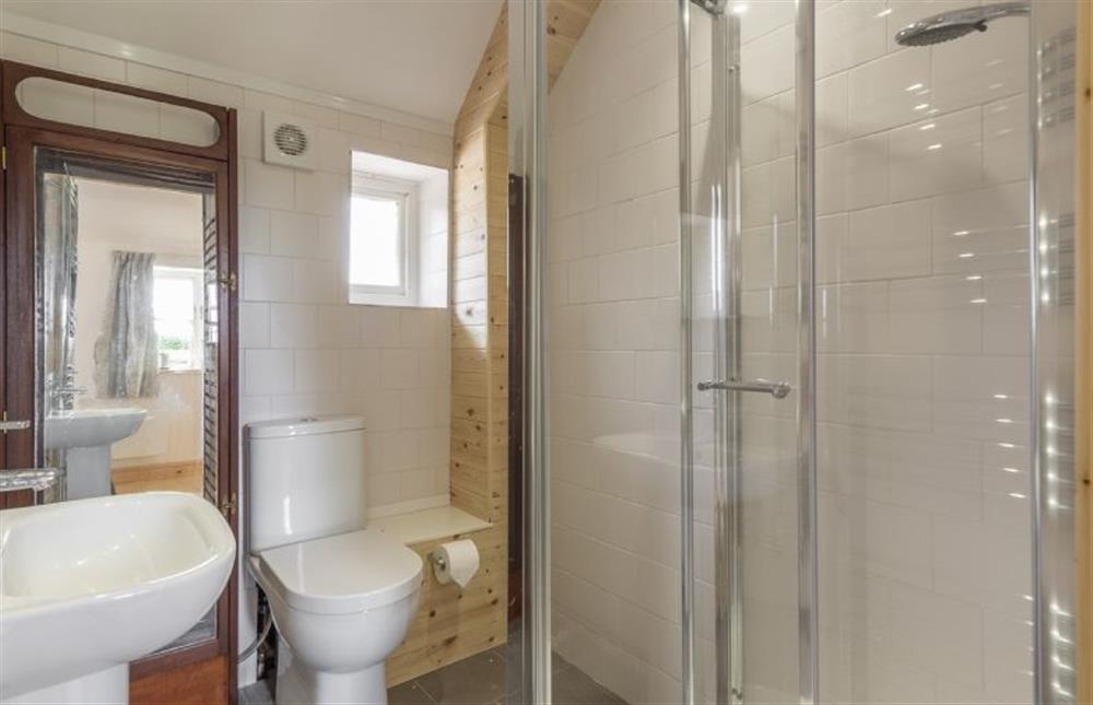 Ground floor:  En-suite shower room with walk in shower and heated towel rail at Gallery Cottage, Wighton near Wells-next-the-Sea