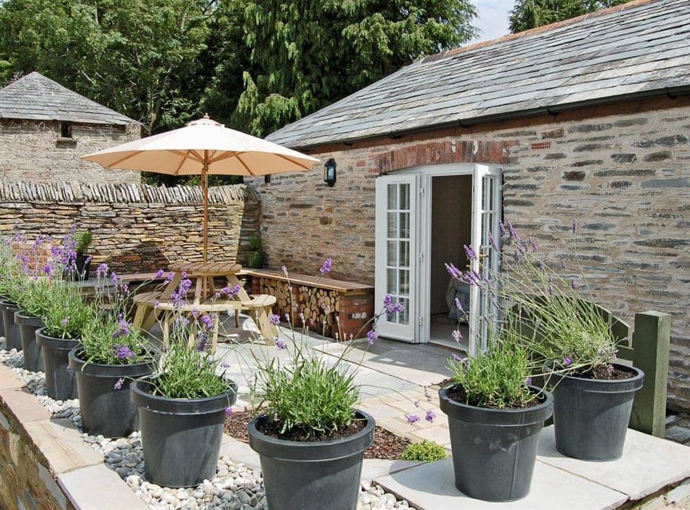 Sitting-out-area at Game Larder Cottage in Washaway, near Bodmin, Cornwall
